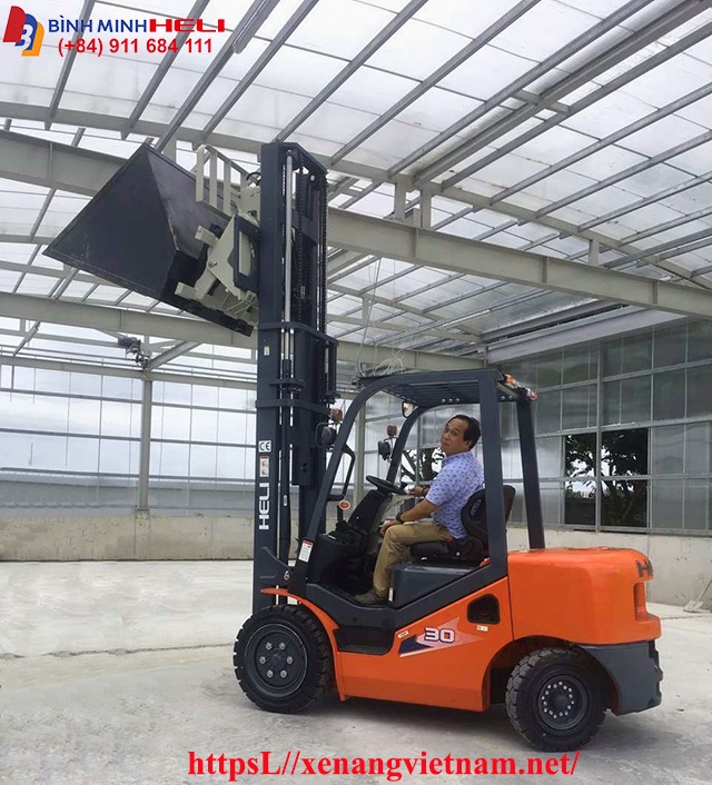 xe nâng xúc đổ hạt điều xe nâng xúc đổ hạt điều